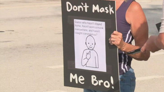 dozens-protest-florida-mask-ordinance-despite-surge-in-cases