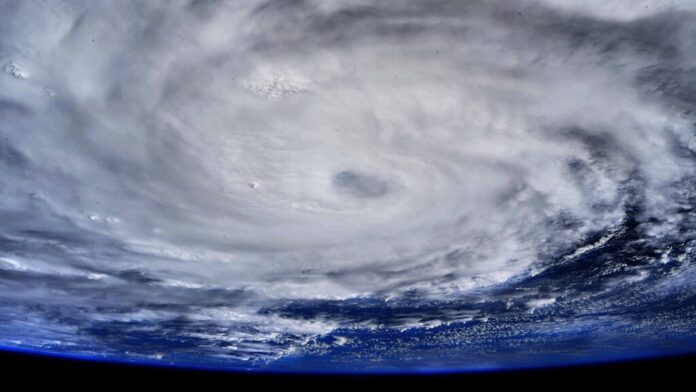 hurricane-hanna’s-‘mesmerizing’-landfall-in-texas-seen-from-space,-‘significant’-rains-present-flood-threat