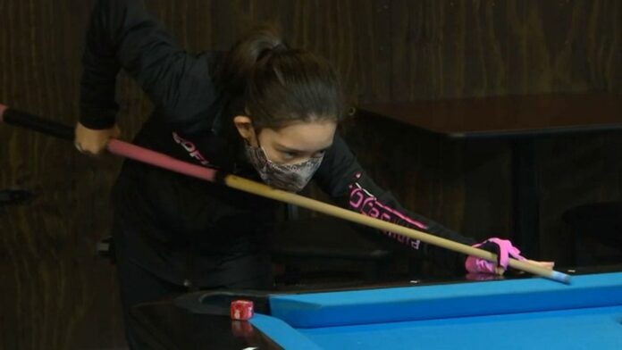 she’s-called-the-pink-dagger-—-and-she-doesn’t-seem-to-miss-a-shot-playing-pool